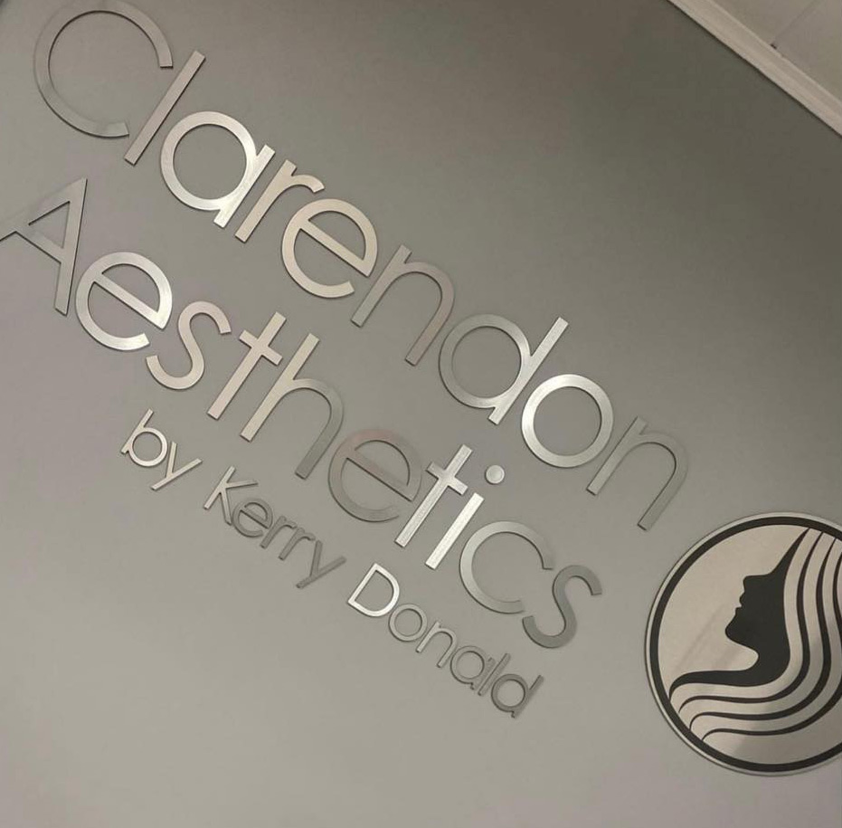 Clarendon Aesthetic signage on the medical aesthetic clinic's wall.